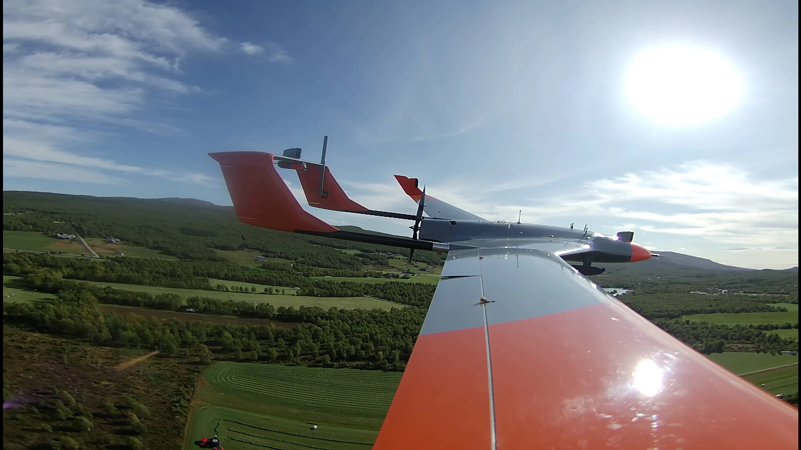 Falk fixed-wing unmanned aircraft flying over agricultural land