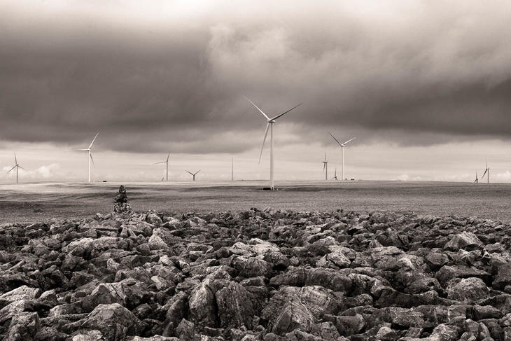 Wind turbines across the rocky plateau at Raggovidda wind farm in northern Norway
